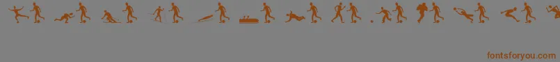 フォントSportsfigures – 茶色の文字が灰色の背景にあります。