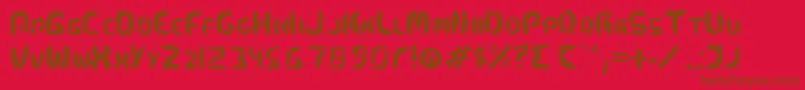 Kismetfont Font – Brown Fonts on Red Background