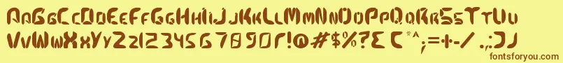 Kismetfont-Schriftart – Braune Schriften auf gelbem Hintergrund