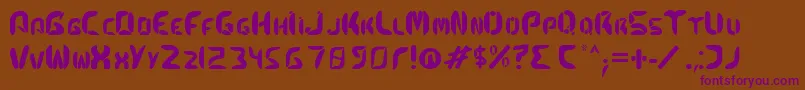 Kismetfont Font – Purple Fonts on Brown Background