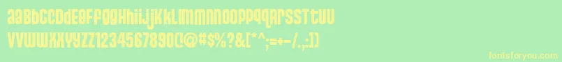 フォントStJosie – 黄色の文字が緑の背景にあります