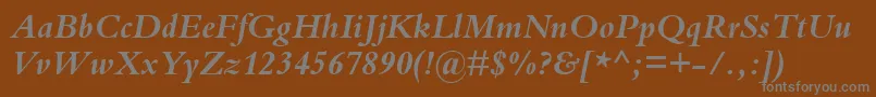 KuriakosBlackSsiBoldItalic Font – Gray Fonts on Brown Background