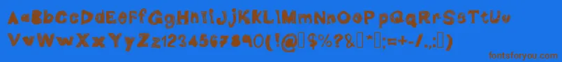 フォントDoubleG – 茶色の文字が青い背景にあります。