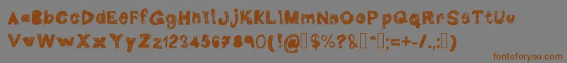 DoubleG-Schriftart – Braune Schriften auf grauem Hintergrund