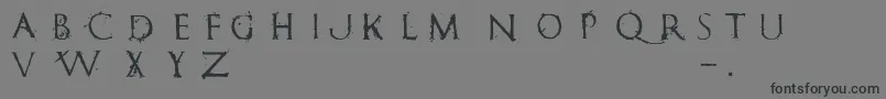 フォントRomanumEst – 黒い文字の灰色の背景