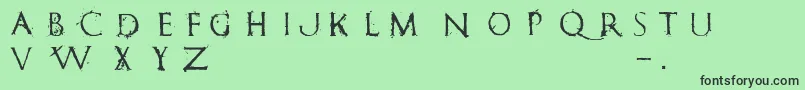 フォントRomanumEst – 緑の背景に黒い文字