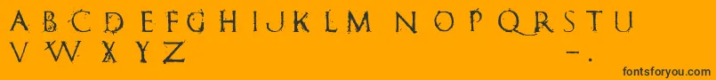 Czcionka RomanumEst – czarne czcionki na pomarańczowym tle