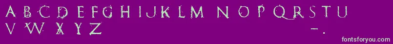フォントRomanumEst – 紫の背景に緑のフォント