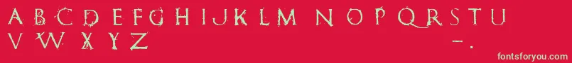 RomanumEst-Schriftart – Grüne Schriften auf rotem Hintergrund