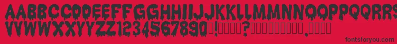 HantuKomKom Font – Black Fonts on Red Background