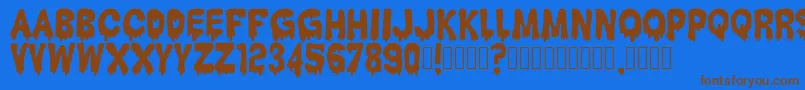 HantuKomKom Font – Brown Fonts on Blue Background