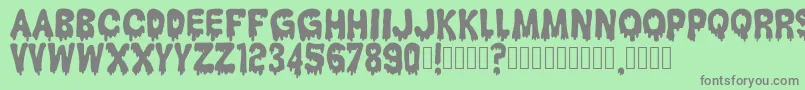 HantuKomKom Font – Gray Fonts on Green Background