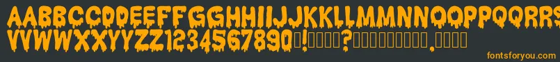 HantuKomKom Font – Orange Fonts on Black Background