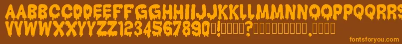 HantuKomKom Font – Orange Fonts on Brown Background