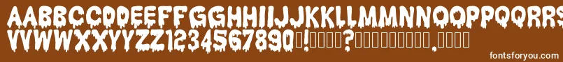 HantuKomKom Font – White Fonts on Brown Background
