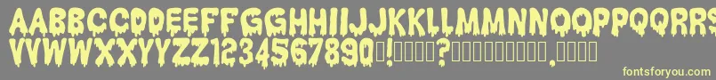 HantuKomKom Font – Yellow Fonts on Gray Background