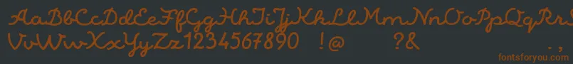 AlaskaScriptDemo-fontti – ruskeat fontit mustalla taustalla