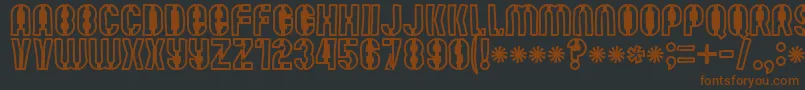 Mute Fruit Black Krash-fontti – ruskeat fontit mustalla taustalla