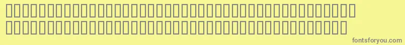 ChicagoLight-fontti – harmaat kirjasimet keltaisella taustalla