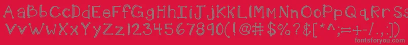 フォントKbshotinthedark – 赤い背景に灰色の文字