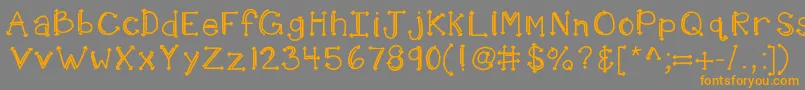 フォントKbshotinthedark – オレンジの文字は灰色の背景にあります。
