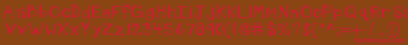 フォントKbshotinthedark – 赤い文字が茶色の背景にあります。