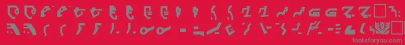 DecepticonRegular-Schriftart – Graue Schriften auf rotem Hintergrund