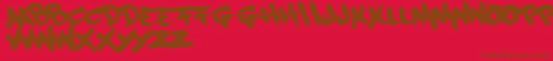Paintcans09Free-Schriftart – Braune Schriften auf rotem Hintergrund