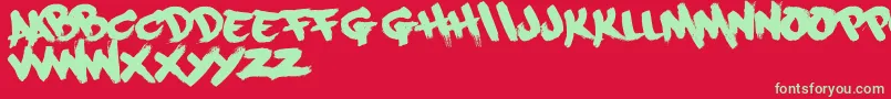 Paintcans09Free Font – Green Fonts on Red Background
