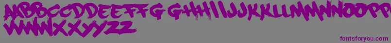 Paintcans09Free-Schriftart – Violette Schriften auf grauem Hintergrund