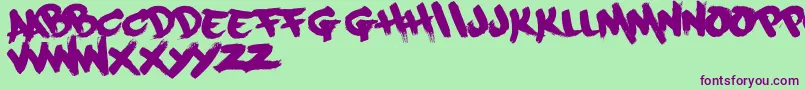Шрифт Paintcans09Free – фиолетовые шрифты на зелёном фоне