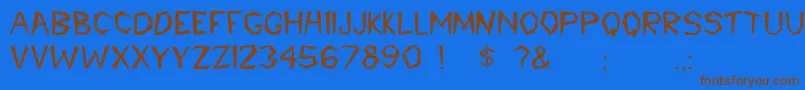 Rscaveman Font – Brown Fonts on Blue Background