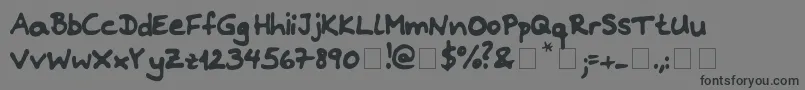 Riddleprint Font – Black Fonts on Gray Background