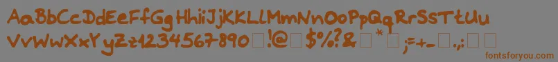 Riddleprint Font – Brown Fonts on Gray Background