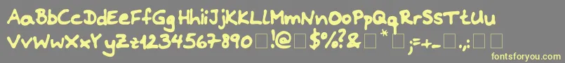 Riddleprint Font – Yellow Fonts on Gray Background