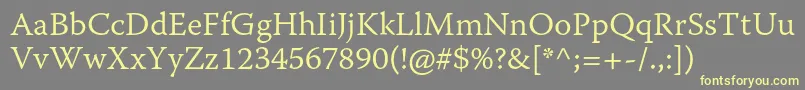 WarnockproLightcapt Font – Yellow Fonts on Gray Background