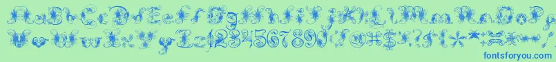 ExtravagantPete-fontti – siniset fontit vihreällä taustalla