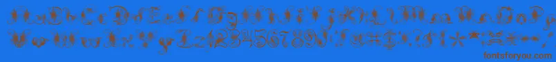 ExtravagantPete-fontti – ruskeat fontit sinisellä taustalla
