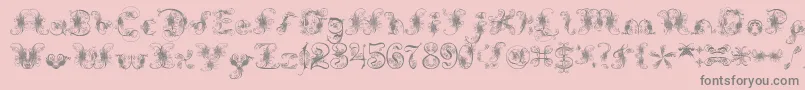 ExtravagantPete-fontti – harmaat kirjasimet vaaleanpunaisella taustalla