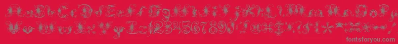 ExtravagantPete-fontti – harmaat kirjasimet punaisella taustalla