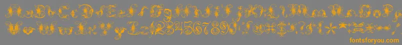 フォントExtravagantPete – オレンジの文字は灰色の背景にあります。