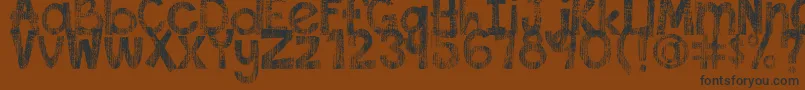 DjbThisFontIsWorn Font – Black Fonts on Brown Background