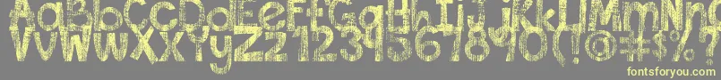 DjbThisFontIsWorn Font – Yellow Fonts on Gray Background