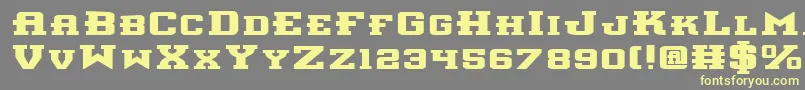 InterceptorBoldExpanded Font – Yellow Fonts on Gray Background