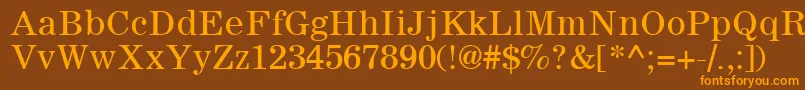 フォントSachem – オレンジ色の文字が茶色の背景にあります。