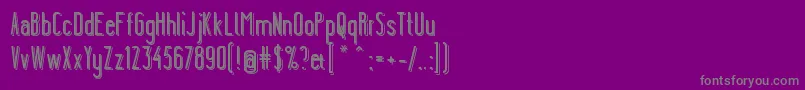 フォントYgraineShadow – 紫の背景に灰色の文字