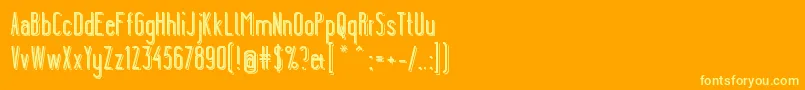 YgraineShadow-Schriftart – Gelbe Schriften auf orangefarbenem Hintergrund