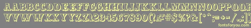 CarnivalmfOpenshadow Font – Yellow Fonts on Gray Background