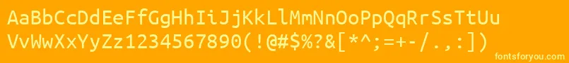 Fonte UbuntumonoRegular – fontes amarelas em um fundo laranja