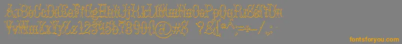 BrucedoublepicaBeveled Font – Orange Fonts on Gray Background